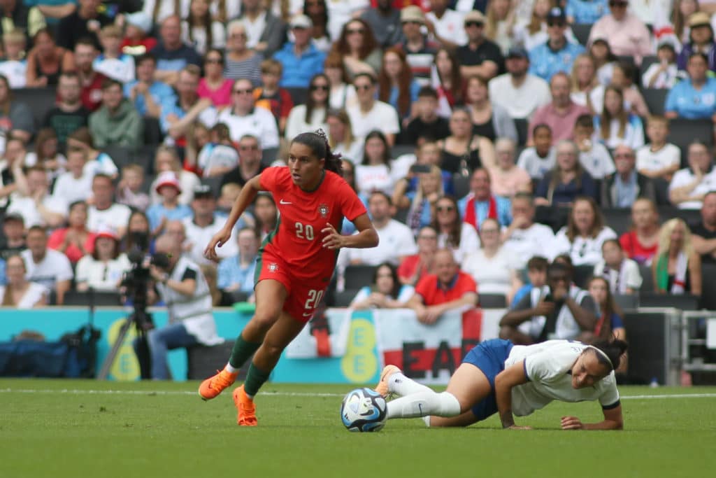 London, April 6th 2023: Francisca Nazareth (20 Portugal) dribbles pass Lucy Bronze (2 England) during the Womens Interna
